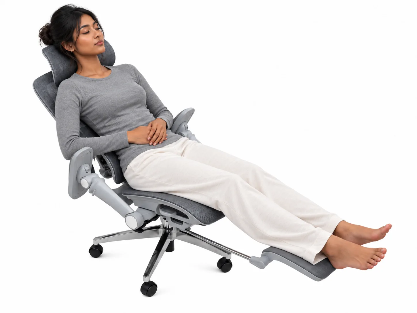 Reclined in Atlas with the footrest extended, eyes closed